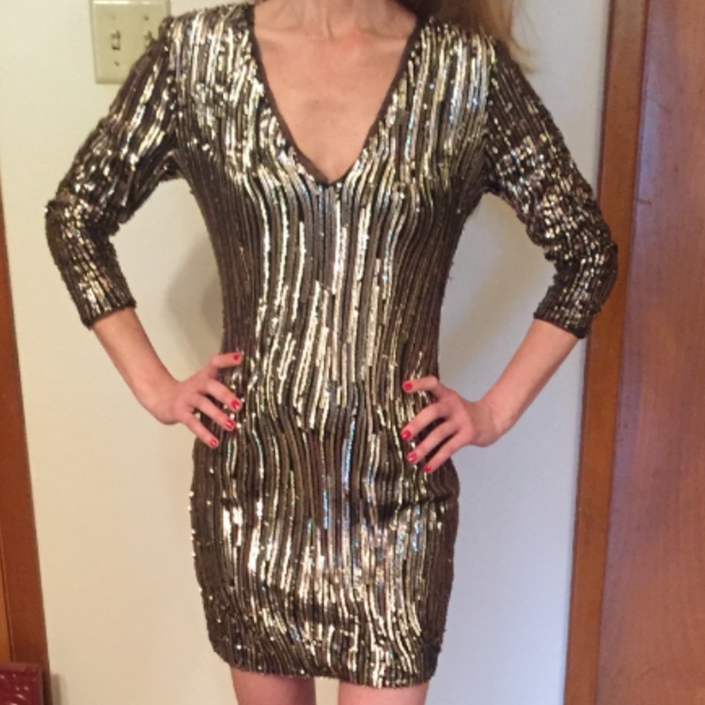 Sequined gold, silver and black party dress